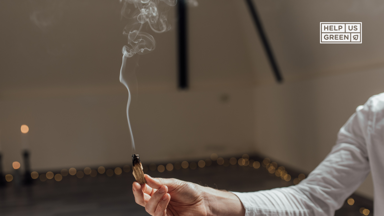 Close-up of a hand holding natural incense cones, highlighting purity and earth-friendly rituals rooted in traditional Indian culture.